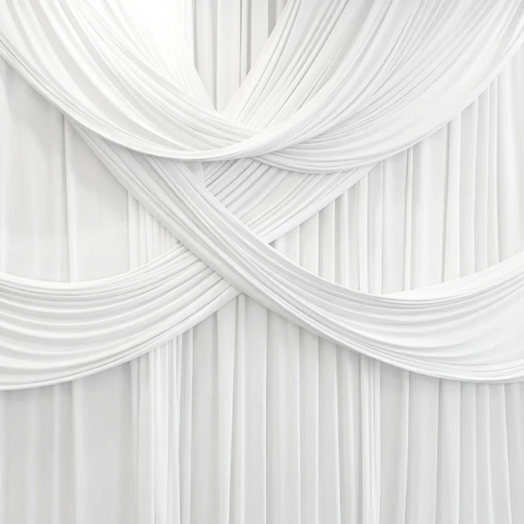 White draped backdrop - The Booth District