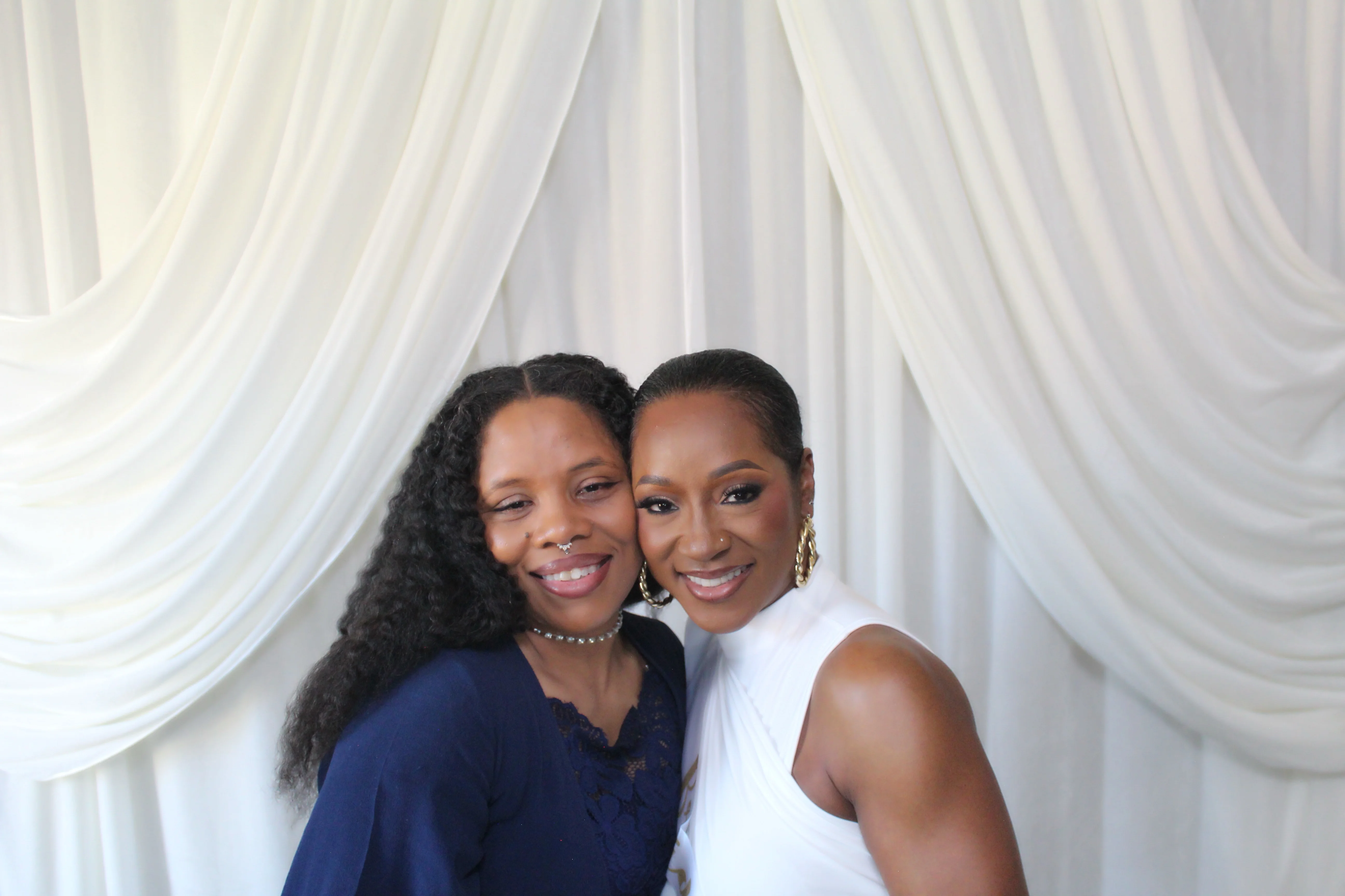 Two women at a photo booth event in the GTA - The Booth District